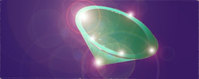 Immagine di uno smeraldo (Per leggerne la descrizione proseguire nel link). Su uno sfondo blu elettrico, si vede, luminoso, uno smeraldo di forma conica.