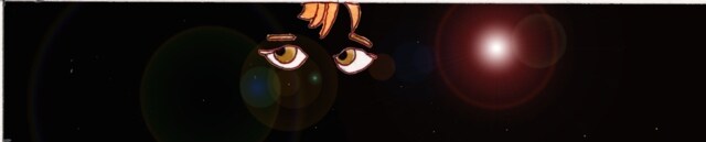 Immagine di Nero(Per leggerne la descrizione proseguire nel link) Nell'oscurità si vedono i suoi occhi ed un ciuffo di cappelli di colore rosso.