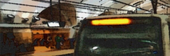 Metro Story : Indice Glossario - Cornice composta da un'immagine sfumata di una stazione: treno e persone al binario.