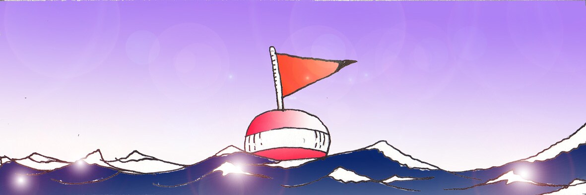 Immagine di una boa sferica galleggiante, di colore rosso con riga al centro bianca e bandierina rossa alla sommità, al centro di un mare increspato.