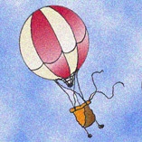 Una mongolfiera in cielo con pallone colorato, a spicchi rossi e bianchi
